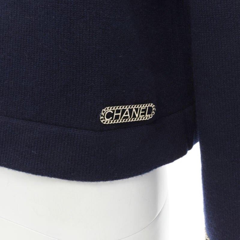 CHANEL 2020 Runway 100% cashmere navy gold chain trim boat neck sweater FR38
Reference: KNLM/A00101
Brand: Chanel
Designer: Virginie Viard
Model: P62947
Collection: Resort 2020 - Runway
Material: Cashmere
Color: Navy, Gold
Pattern: Solid
Extra