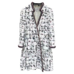 CHANEL Sfilata 2020: cappotto in tweed bianco con logo CC da 16.000 $