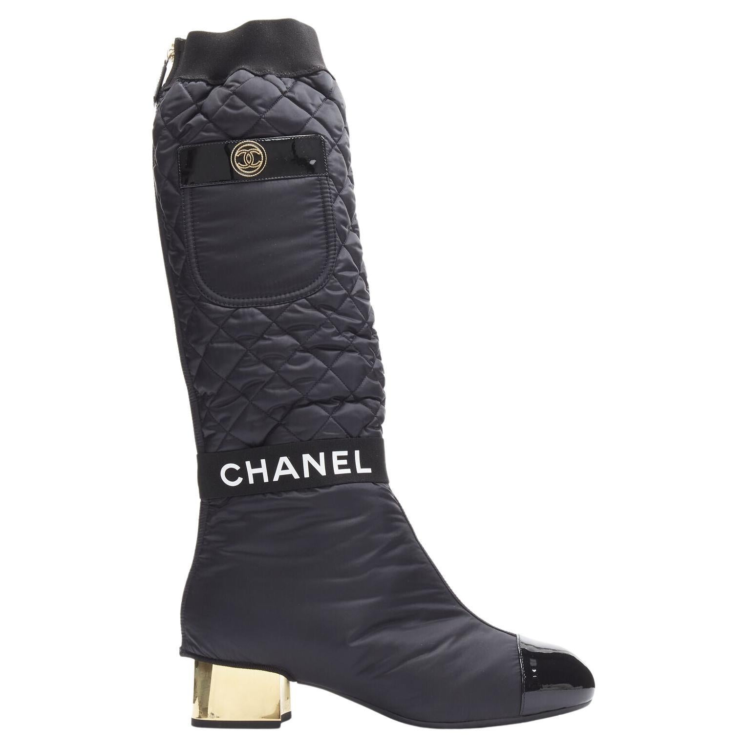 CHANEL 2021 black gold CC logo padded nylon block heeled high boots EU38.5 For Sale