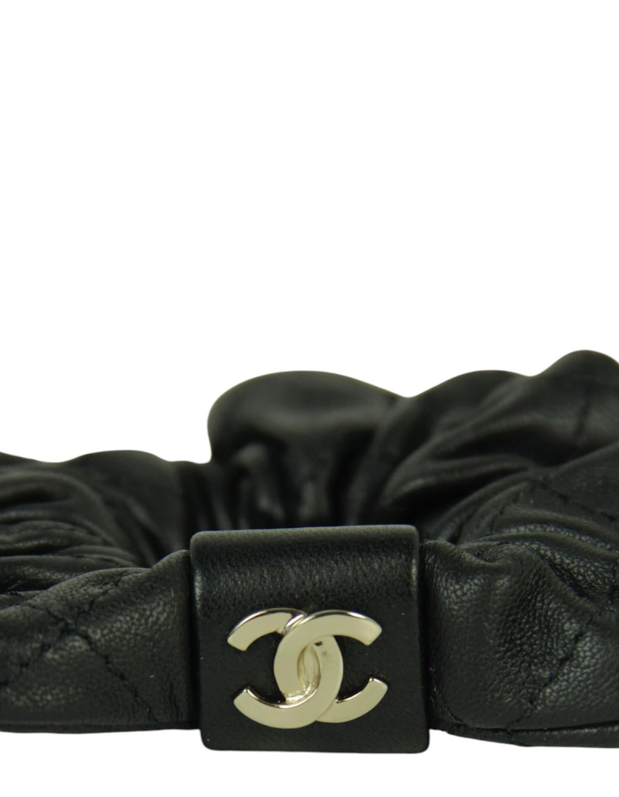 Chanel 2021 Black Leather Lambskin Quilted CC Hair Scrunchie 

Made In: France
Year of Production: 2021
Color: Black
Hardware: Goldtone
Materials: Lambskin leather, metal
Condition: Excellent

Measurements:
1.5