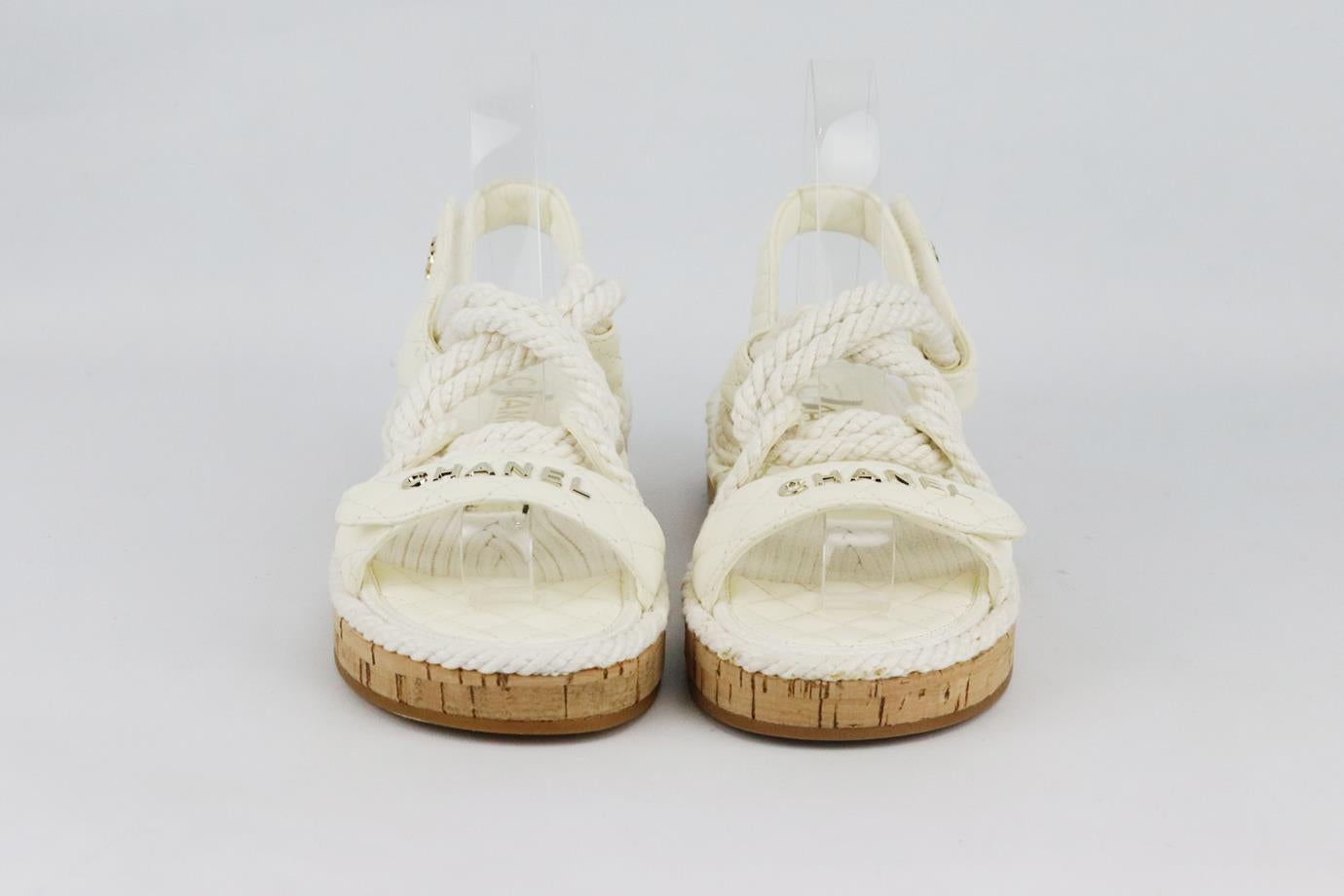 Chanel 2021 CC detailed rope and quilted leather sandals. Made from ivory quilted leather and rope with gold-tone CC and logo detail and cook soles. Ivory. Fastening at side. Does not come with box or dustbag. Size: EU 38 (UK 5, US 8). Insole: 9.8
