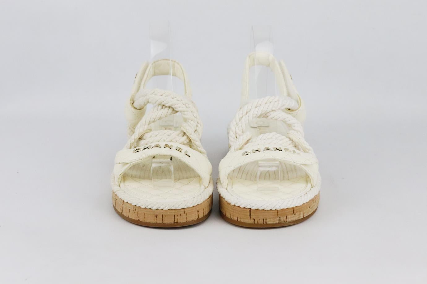 Chanel 2021 CC detailed rope and quilted leather sandals. Made from ivory quilted leather and rope with gold-tone CC and logo detail and cook soles. Ivory. Fastening at side. Does not come with box or dustbag. Size: EU 38 (UK 5, US 8). Insole: 9.8