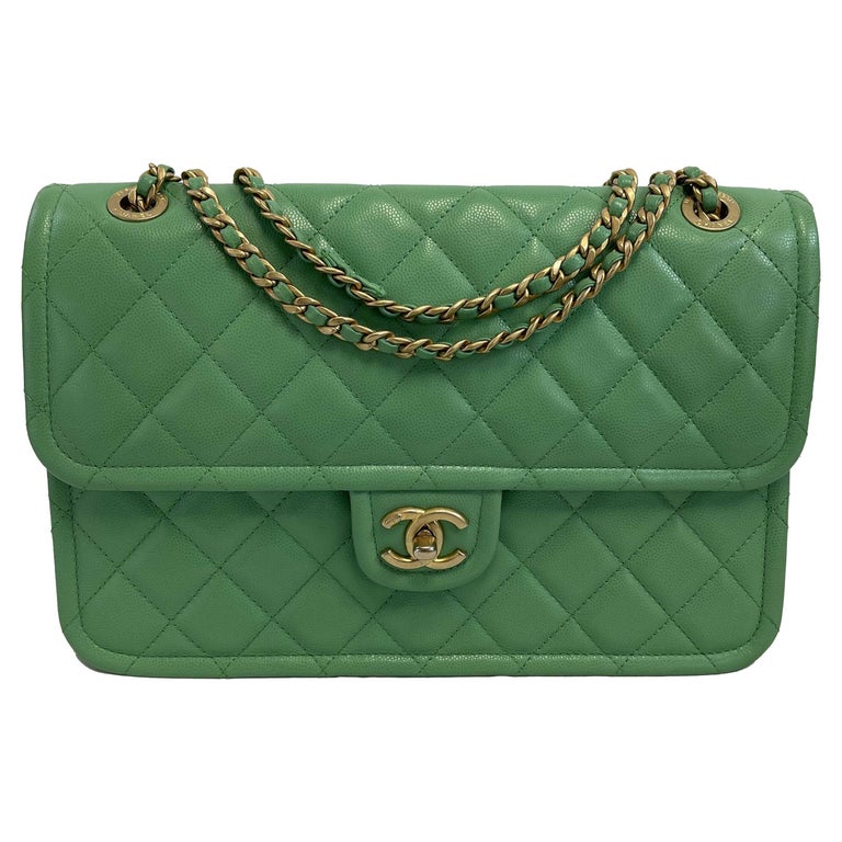 Sold at Auction: Chanel - a mini flap bag in green diamond-quilted lambskin  leather, circa 2016, square body with front flap fastens with interlocking  CC turn-lock, equipped with leather and chain shoulder