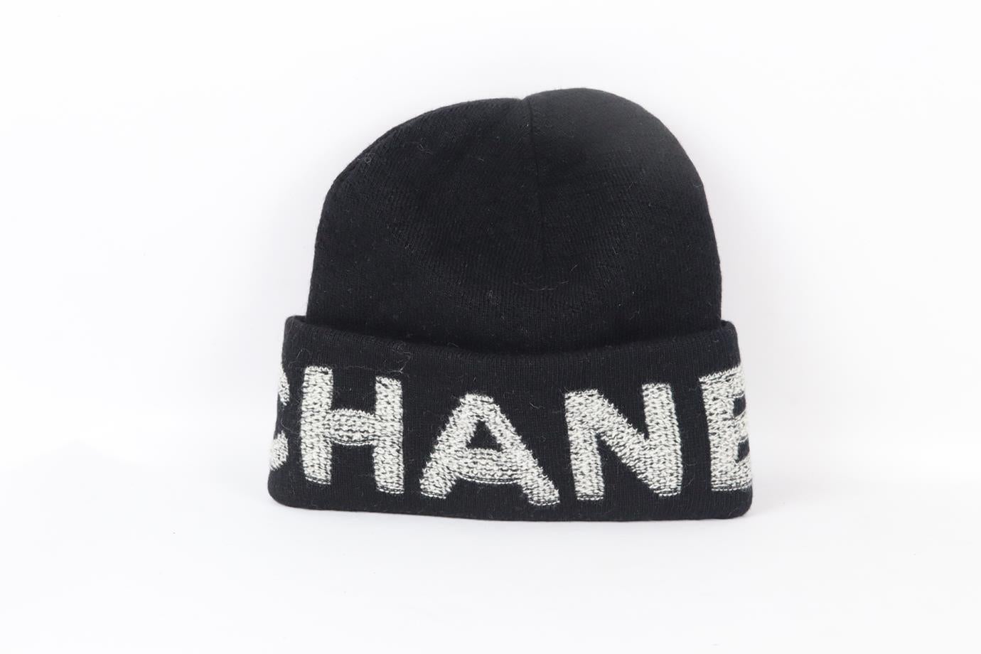 Chanel 2021 logo intarsia wool and cashmere blend beanie. Black and white. 70% Wool, 30% cashmere. Does not come with dustbag or box. Size: One Size. Height: 9 in. Circumference: 22 in. Very good condition - Worn once. No sign of wear; see pictures.