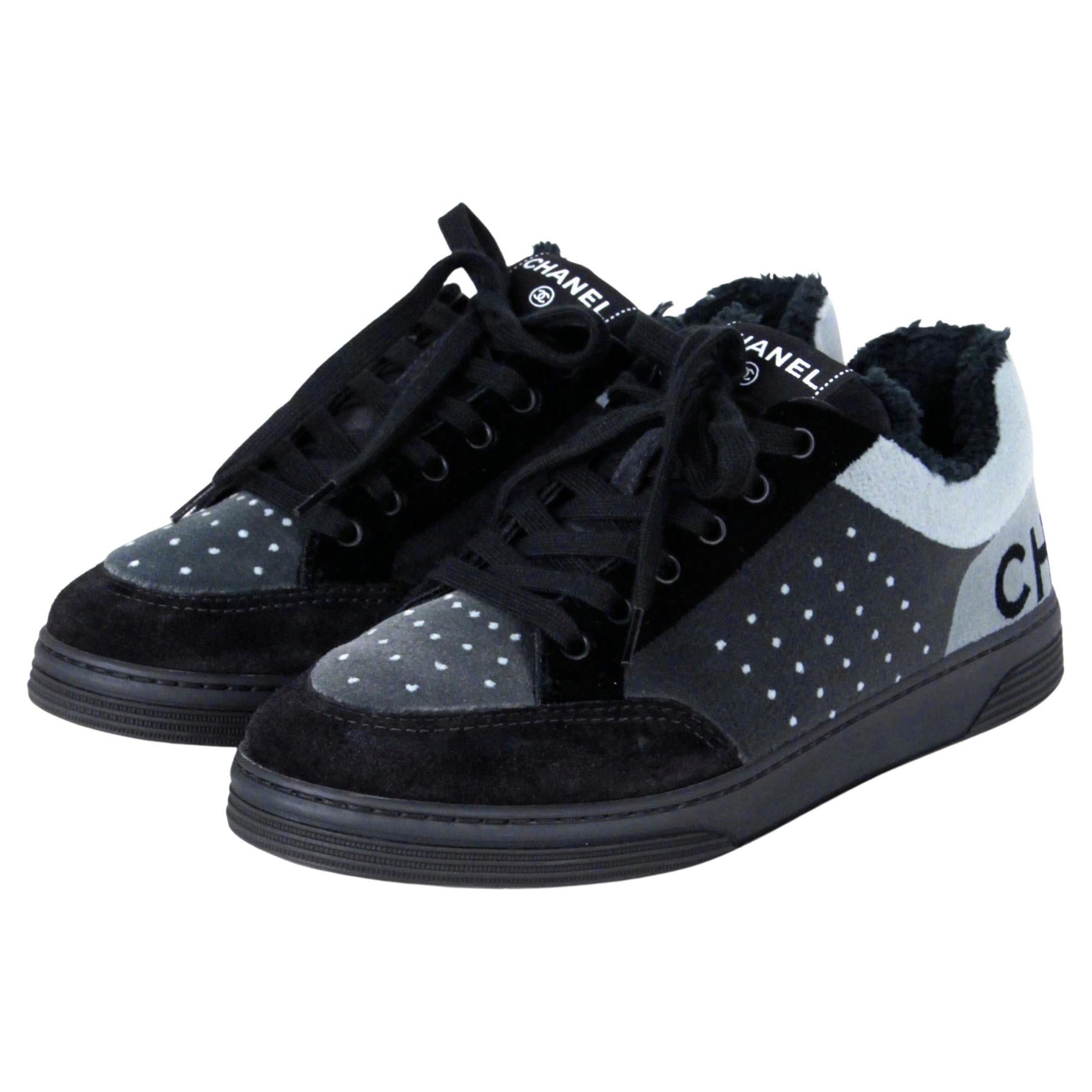 Chanel 2021 Grey/Black Velvet Sneakers sz 38

Made In: Italy
Year of Production: 2021
Color: Black, grey
Materials: Velvet
Closure/Opening: Front laces
Overall Condition: New, never worn
Includes: Two dustbags 

Marked Size: 38