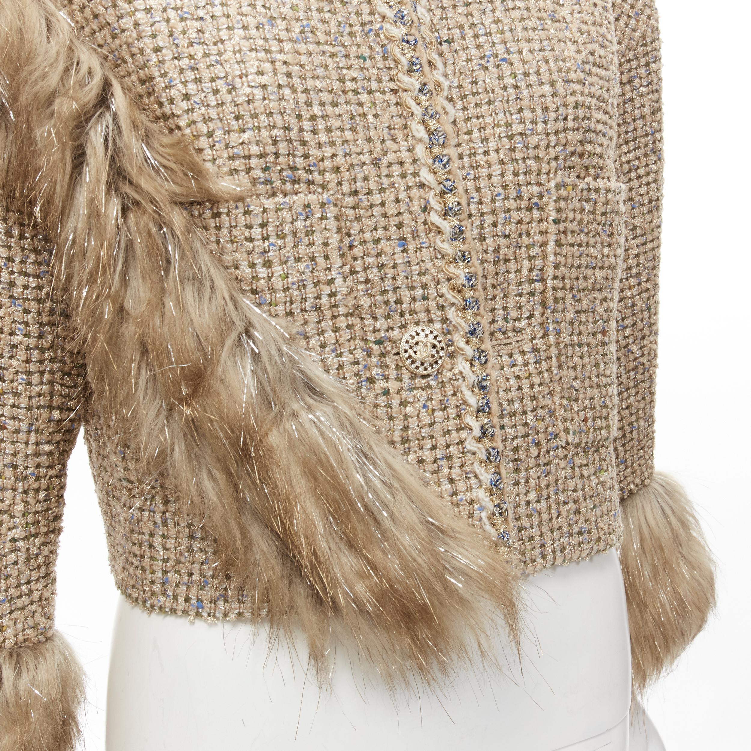 CHANEL 2021 Runway metallic gold Tweed faux fur trim cropped jacket FR34
Brand: Chanel
Designer: Virginie Viard
Collection: Fall Winter 2020 Runway
Material: Tweed
Color: Gold
Pattern: Solid
Closure: Button
Extra Detail: Metallic gold and blue lurex