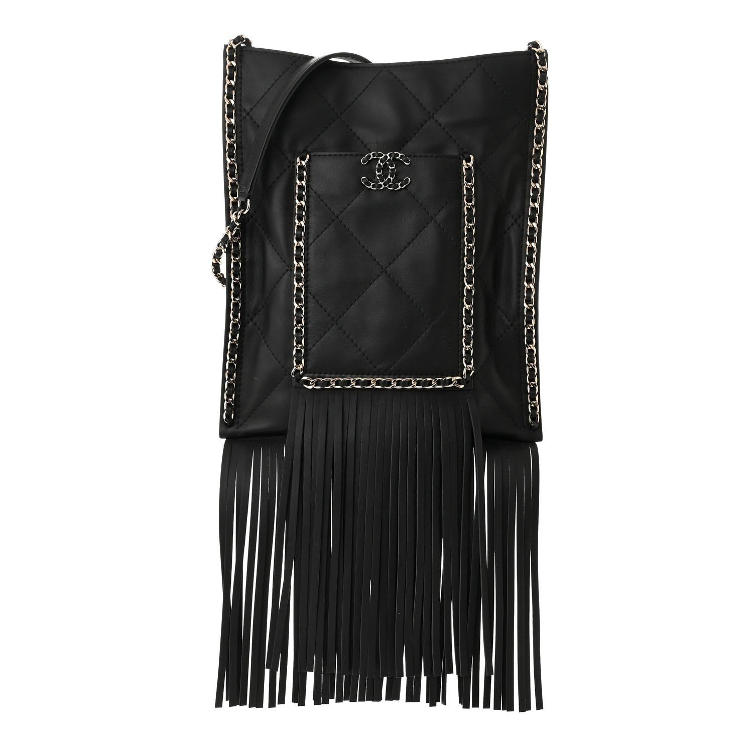 Chanel 2022 Cruise Small Fringe Crossbody Hobo Quilted Classic Bag

Gold hardware
Black quilted lambskin leather
Classic interwoven chain strap 
Fringe ends
Front pocket
Gold hardware
Black fabric interior

Made in Italy

19