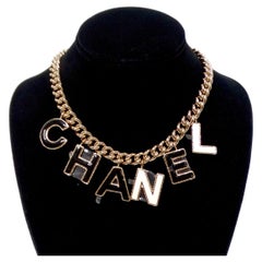 Chanel 2022 Gold-Tone Black & White Logo Charm Chain Link Necklace
