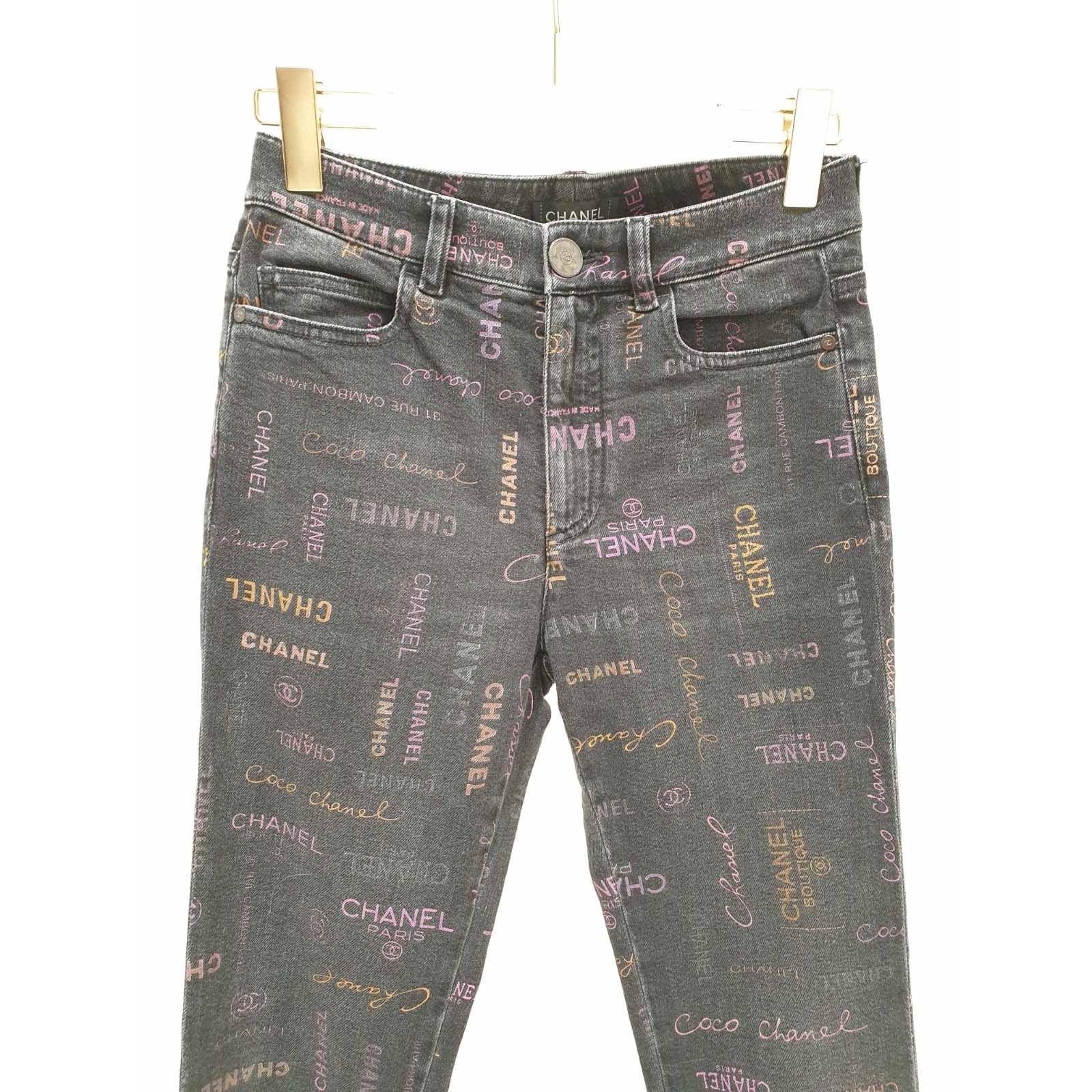 Elevate your wardrobe with these stylish Chanel Graffiti Logo Printed Denim Jeans from the 2022 collection! In excellent condition, these jeans are a must-have for any fashion enthusiast. The iconic graffiti logo adds a unique and trendy touch to