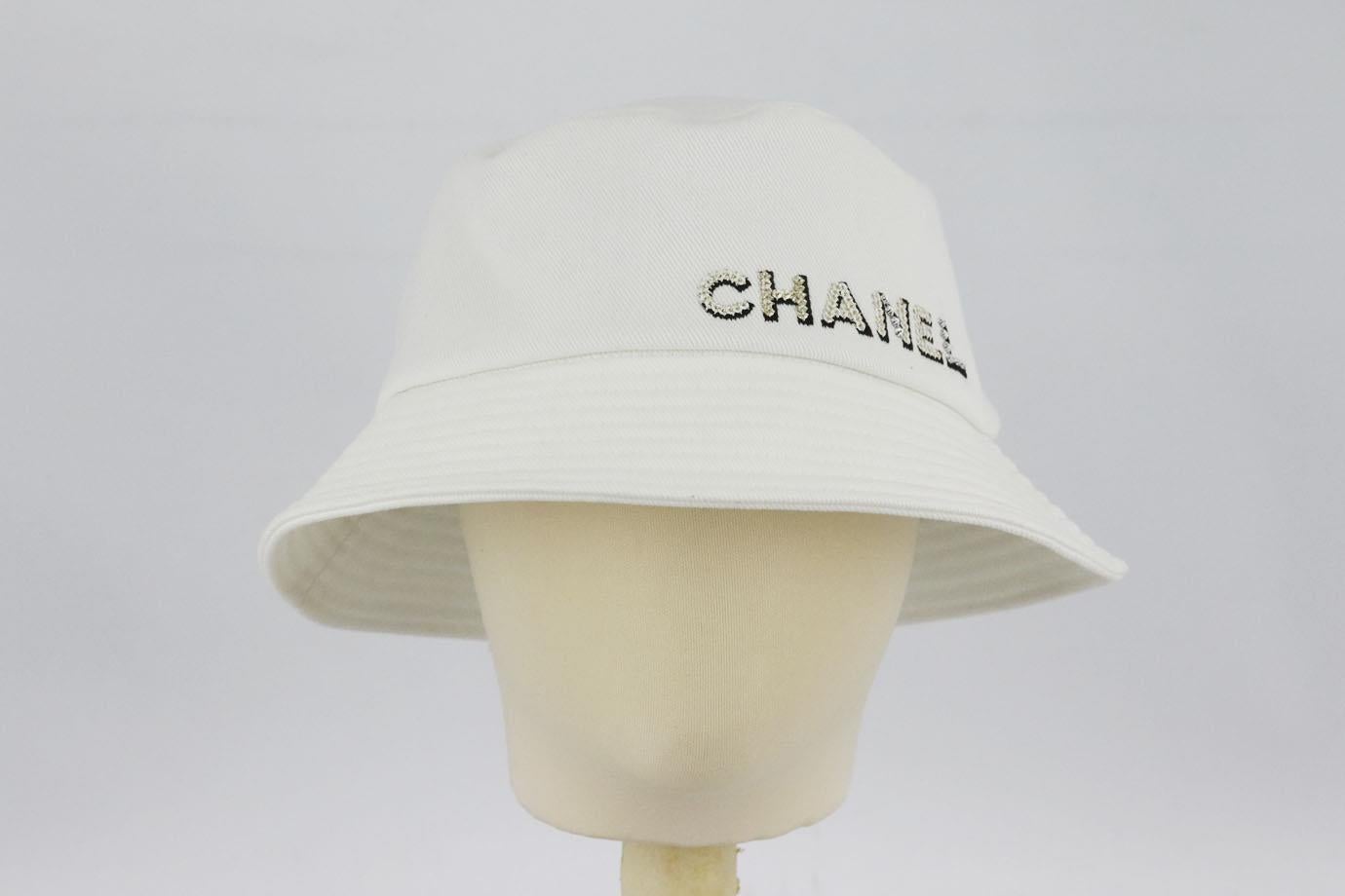 Chanel 2022 logo embellished cotton twill bucket hat. White. Slips on. 100% Cotton; lining: 100% cotton. Does not come with dustbag or box. Size: Medium (57 cm). Brim Width: 2.2 in New with tags
