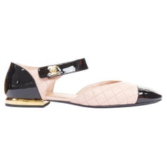 CHANEL 2022 pink quilted leather black patent turnlock CC mary-janes EU39.5