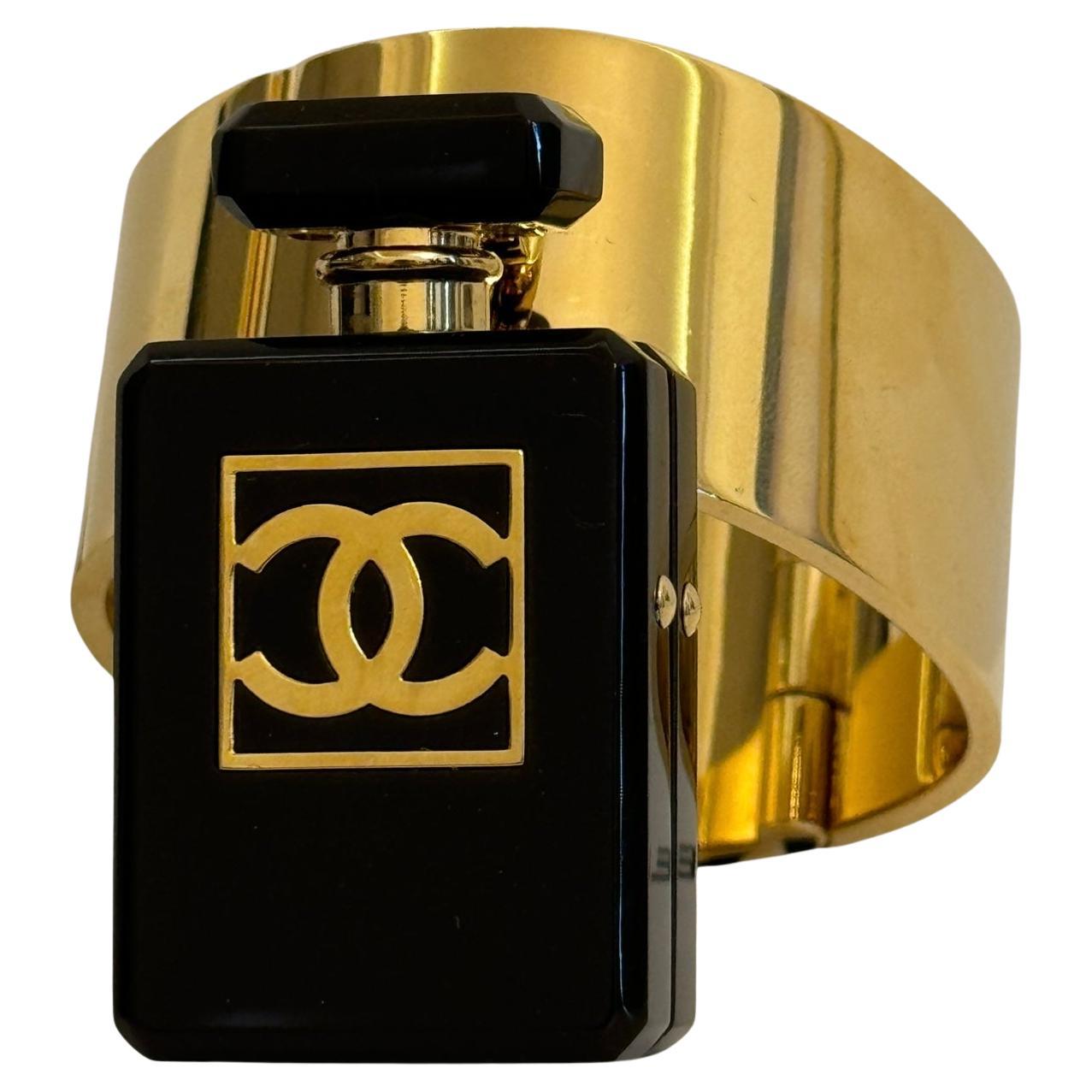 Chanel 2022 runway cuff bracelet featuring a micro minaudière with mirror For Sale
