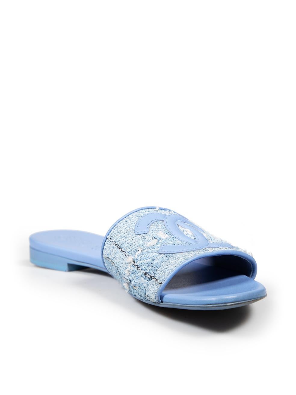 CONDITION is Very good. Minimal wear to the sliders is evident. Abrasion to the front of both in soles and to the back of the right in sole. Peeling and discolouration to the back of the heel on this used Chanel designer resale item. This pair of