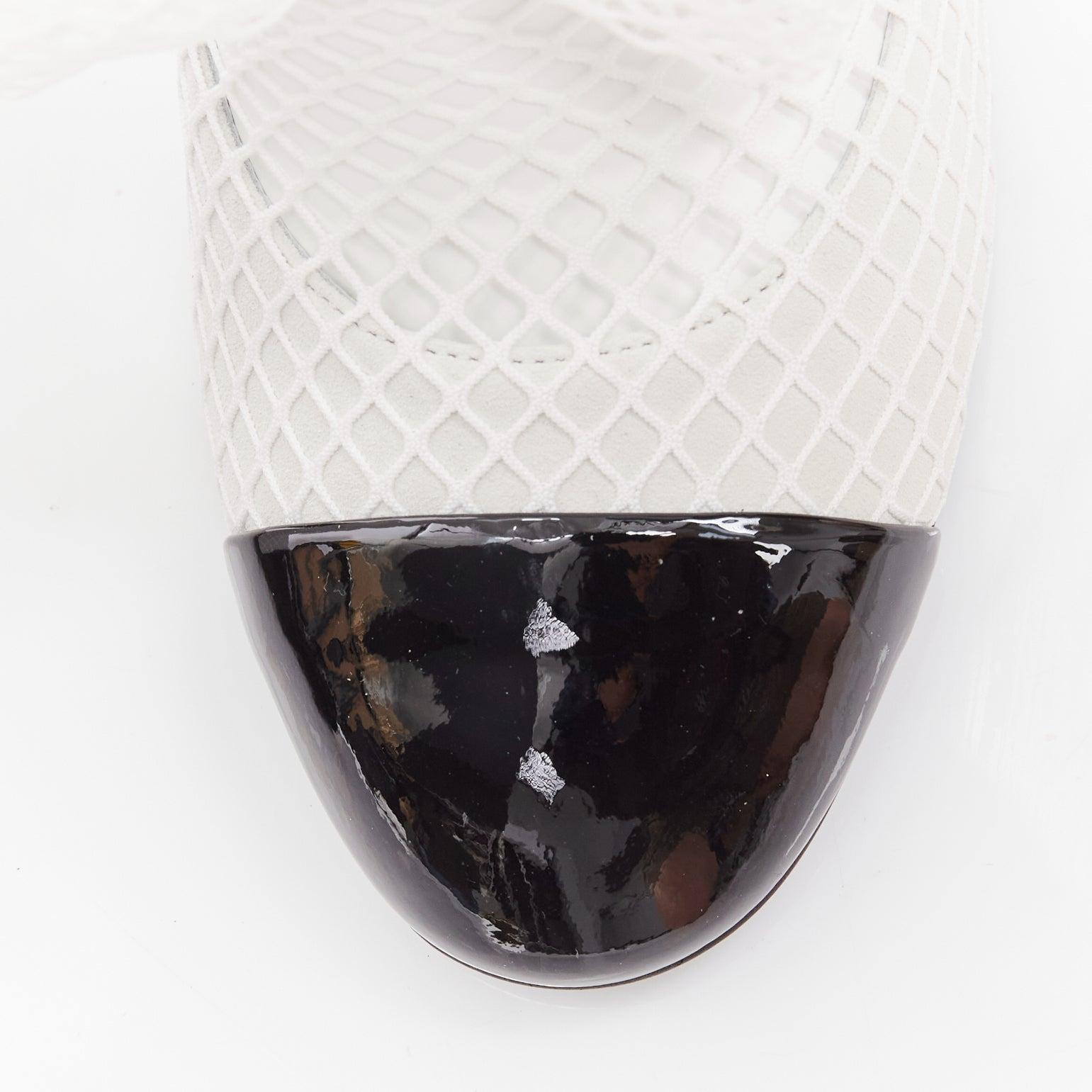 CHANEL 2023 Runway black toe cap white bow CC fishnet thigh high heels EU38.5 For Sale 2