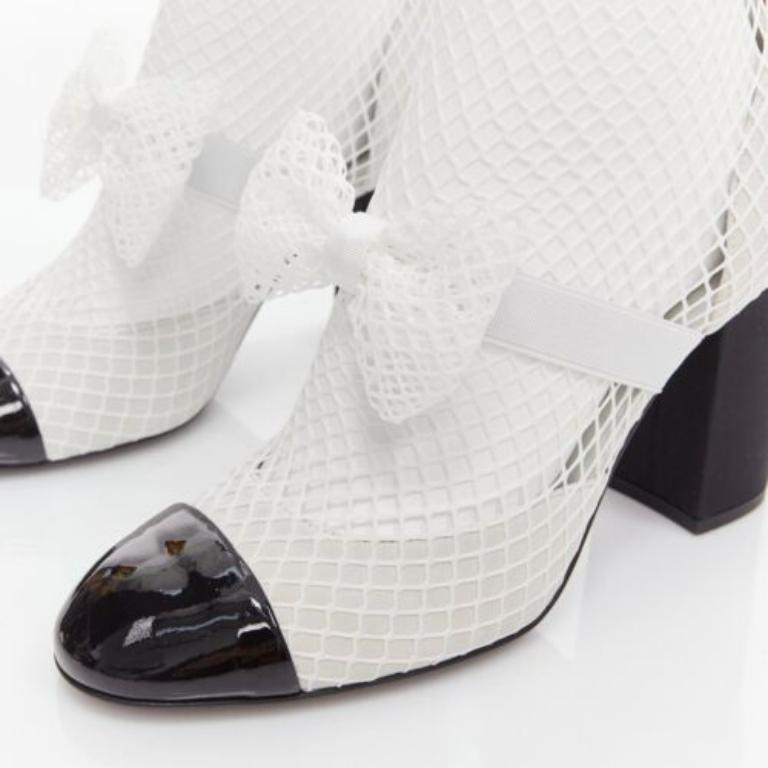CHANEL 2023 Runway black toe cap white bow CC fishnet thigh high heels EU38.5 2