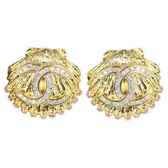 Chanel 2023 Shell Crystal Gold Tone Clip On Earrings