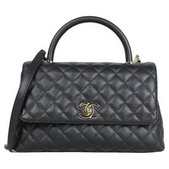 Chanel 2024 Borsa piccola con manico trapuntato in pelle di caviale nera Coco Handle Flap
