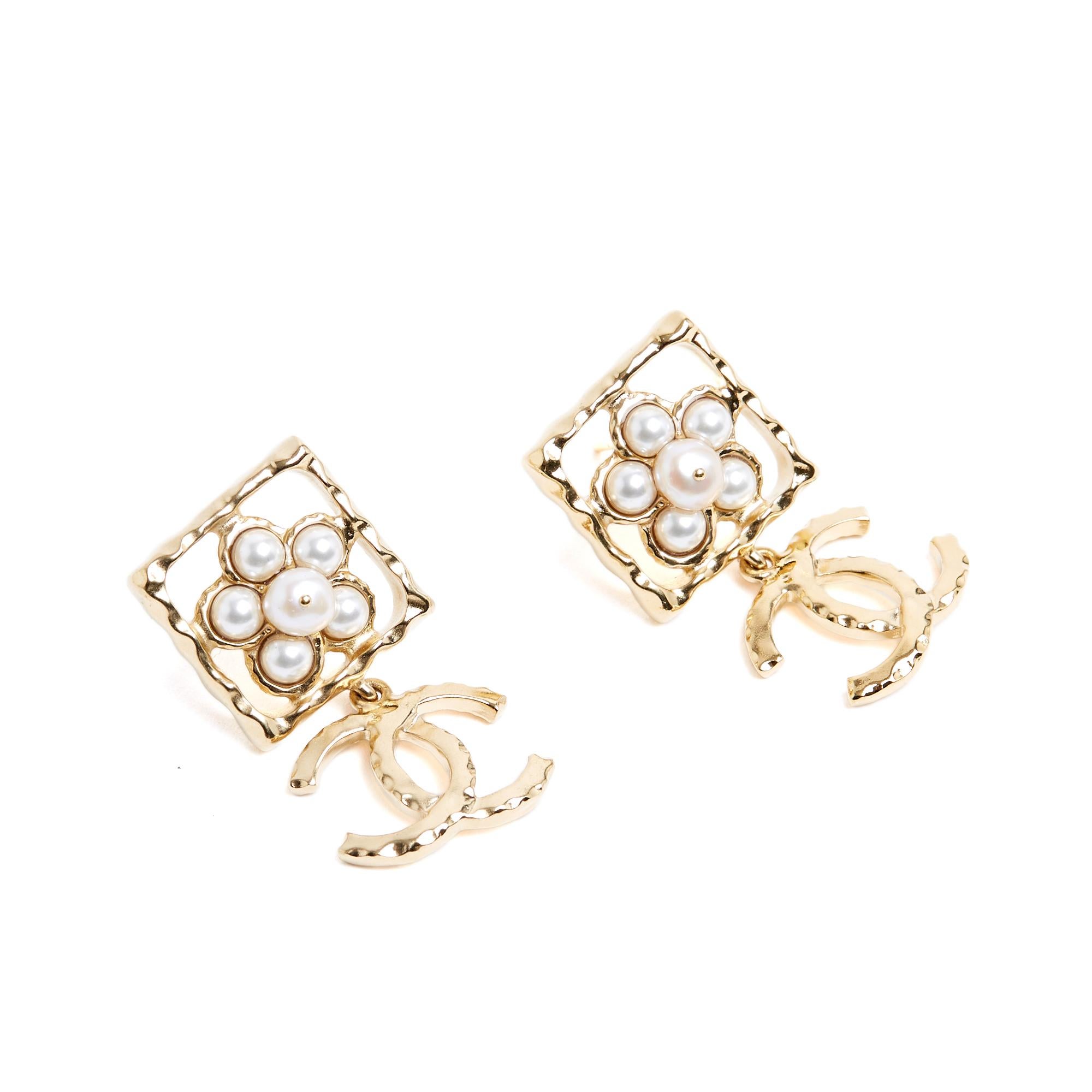 Chanel earrings collection AH2024 gold metal studs with a 