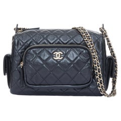 CHANEL 2024 Multi-Pocket Camera Case black quilted lambskin gold hardware bag