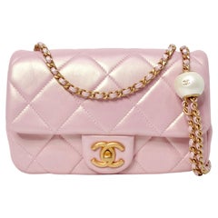 Chanel 2024 Pink Pearly Iridescent Quilted Lambskin Leather Mini Crossbody Bag