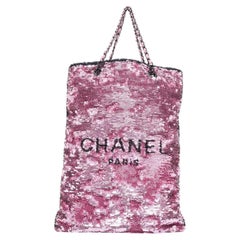 CHANEL 2024 Runway sequin leather block logo chain vertical shopping tote bag