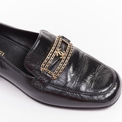 CHANEL 2025 black textured calfski gold CC chain link mocassin loafer shoes EU37