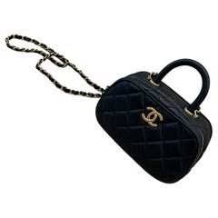 Chanel 2025A Black Mini Bowling Bag with Matte Gold Hardware Chanel 2025A Black Mini Bowling Bag with Matte Gold Hardware
