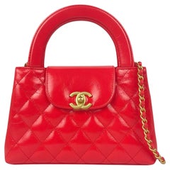 Chanel 2025C Bolso Crossbody Nano Kelly acolchado de piel de becerro rojo oscuro