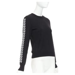 CHANEL 21A black wool sequin CC logo stripe sleeve crewneck pullover FR34 XS