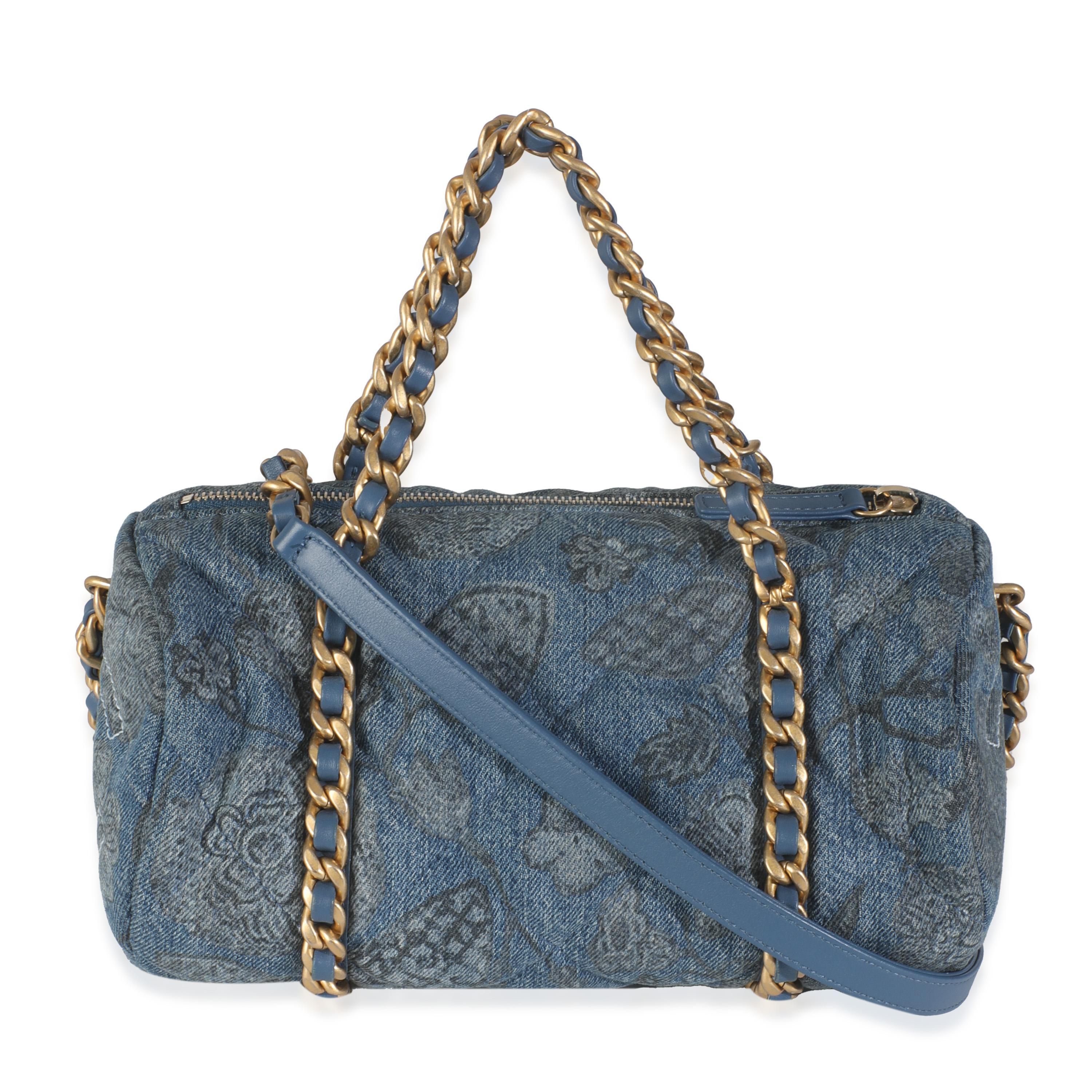 Listing Title: Chanel 21A Blue Floral Quilted Denim Destination Chenonceau Bowling Bag
SKU: 146136
Condition: Pre-owned 
Handbag Condition: Excellent
Condition Comments: Item is in excellent condition and displays light signs of wear.   Minor
