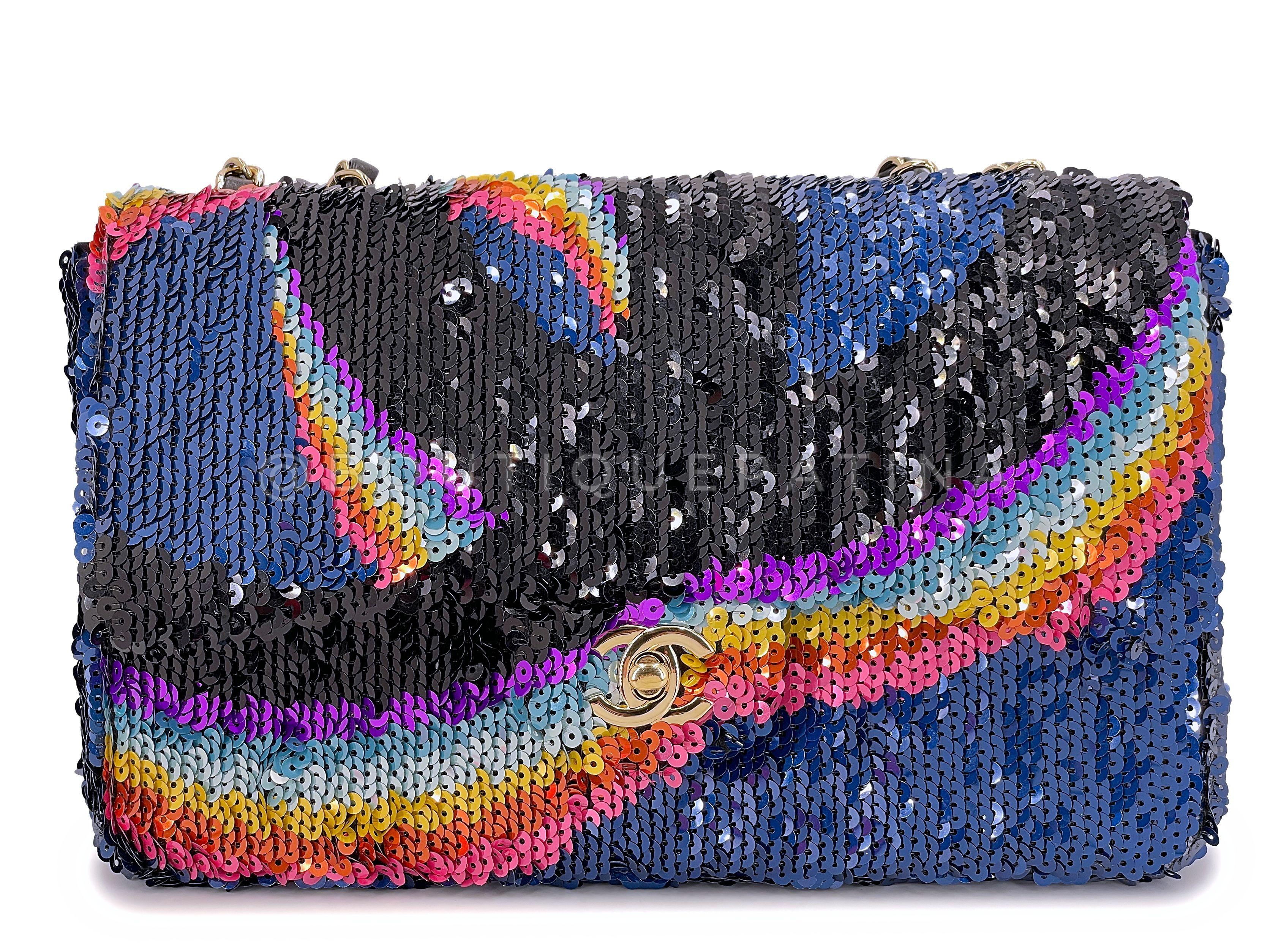 Store item: 67259
A stunning collectible from 2021 is this Chanel 21K Rainbow Sequin Medium Flap Bag. 

Made of a sequin exterior of rainbow hues, a giant 
