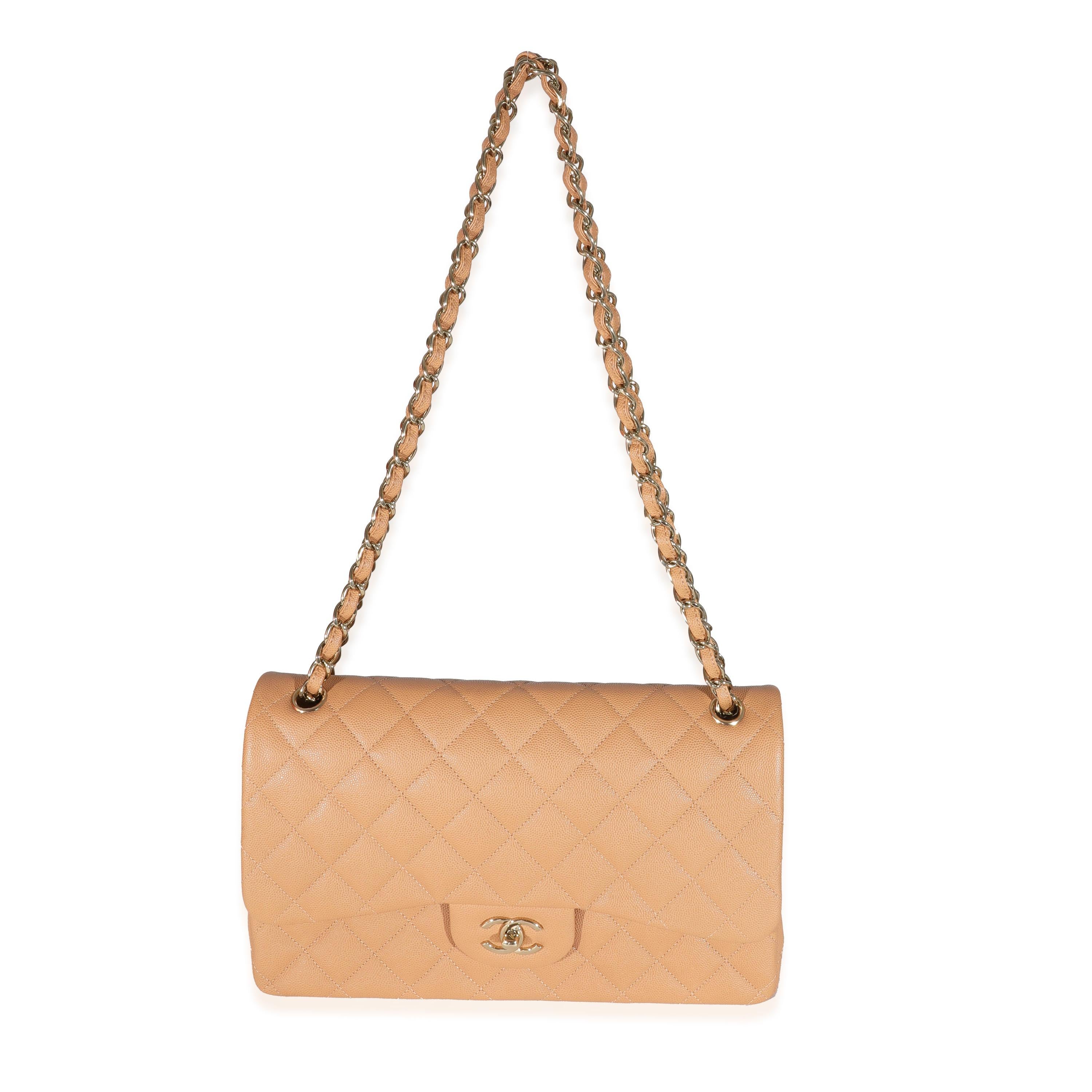 Listing Title: Chanel 21P Caramel Caviar Jumbo Classic Double Flap Bag
SKU: 131705
MSRP: 11000.00
Condition: Pre-owned 
Condition Description: A timeless classic that never goes out of style, the flap bag from Chanel dates back to 1955 and has seen