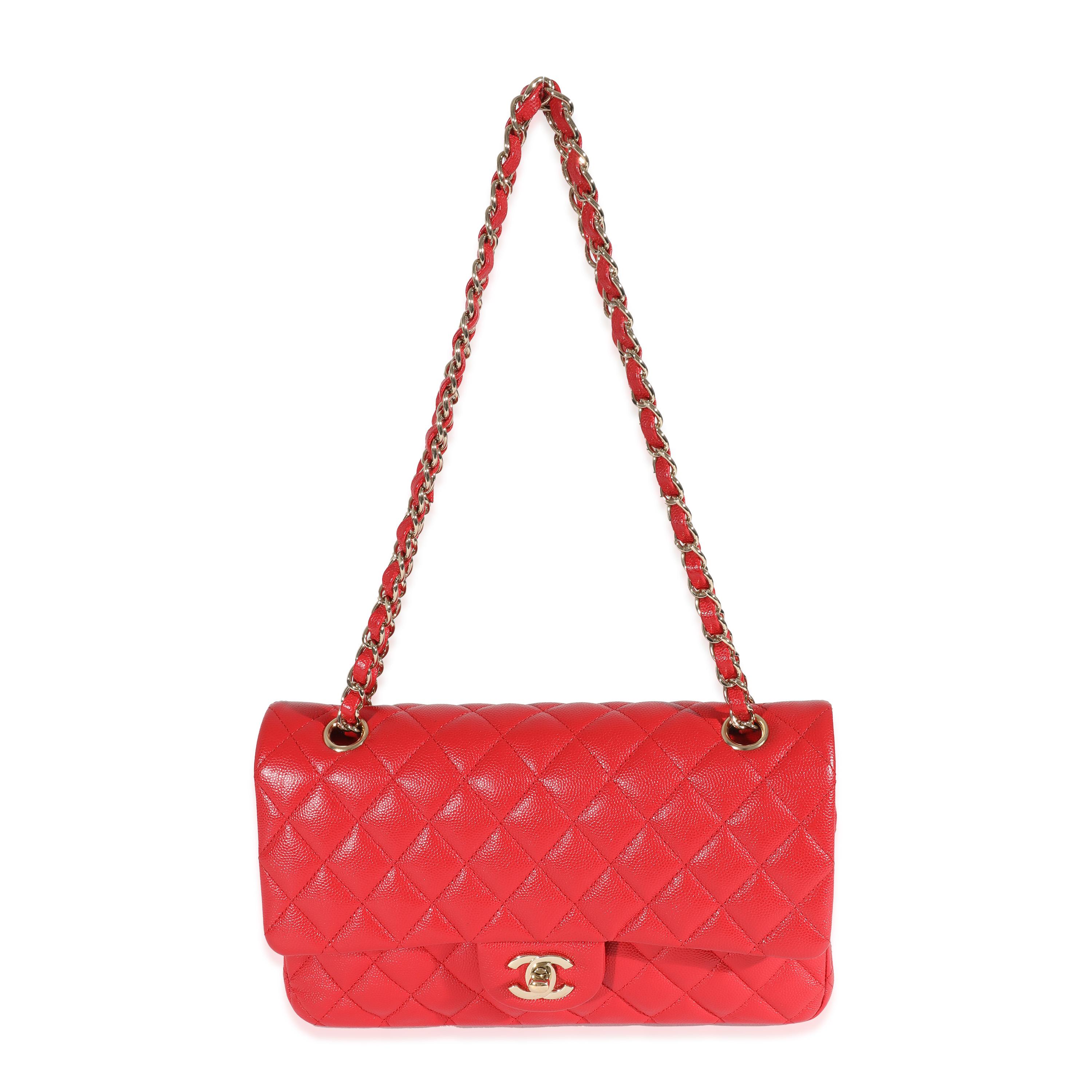 Listing Title: Chanel 21S Red Caviar Medium Classic Double Flap
SKU: 129867
Condition: Pre-owned 
Condition Description: A timeless classic that never goes out of style, the flap bag from Chanel dates back to 1955 and has seen a number of updates.