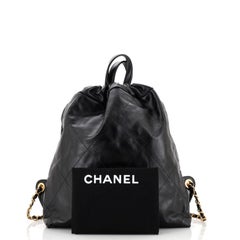 Sac à dos Chanel 22 en cuir de veau matelassé grand format