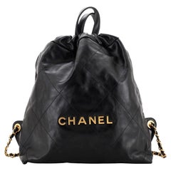 Sac à dos Chanel 22 en cuir de veau matelassé grand format