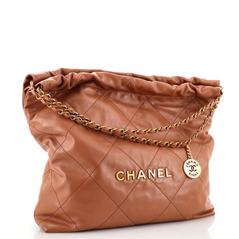 CHANEL Shiny Crumpled Calfskin Quilted Pearl Mini Chanel 22 Black