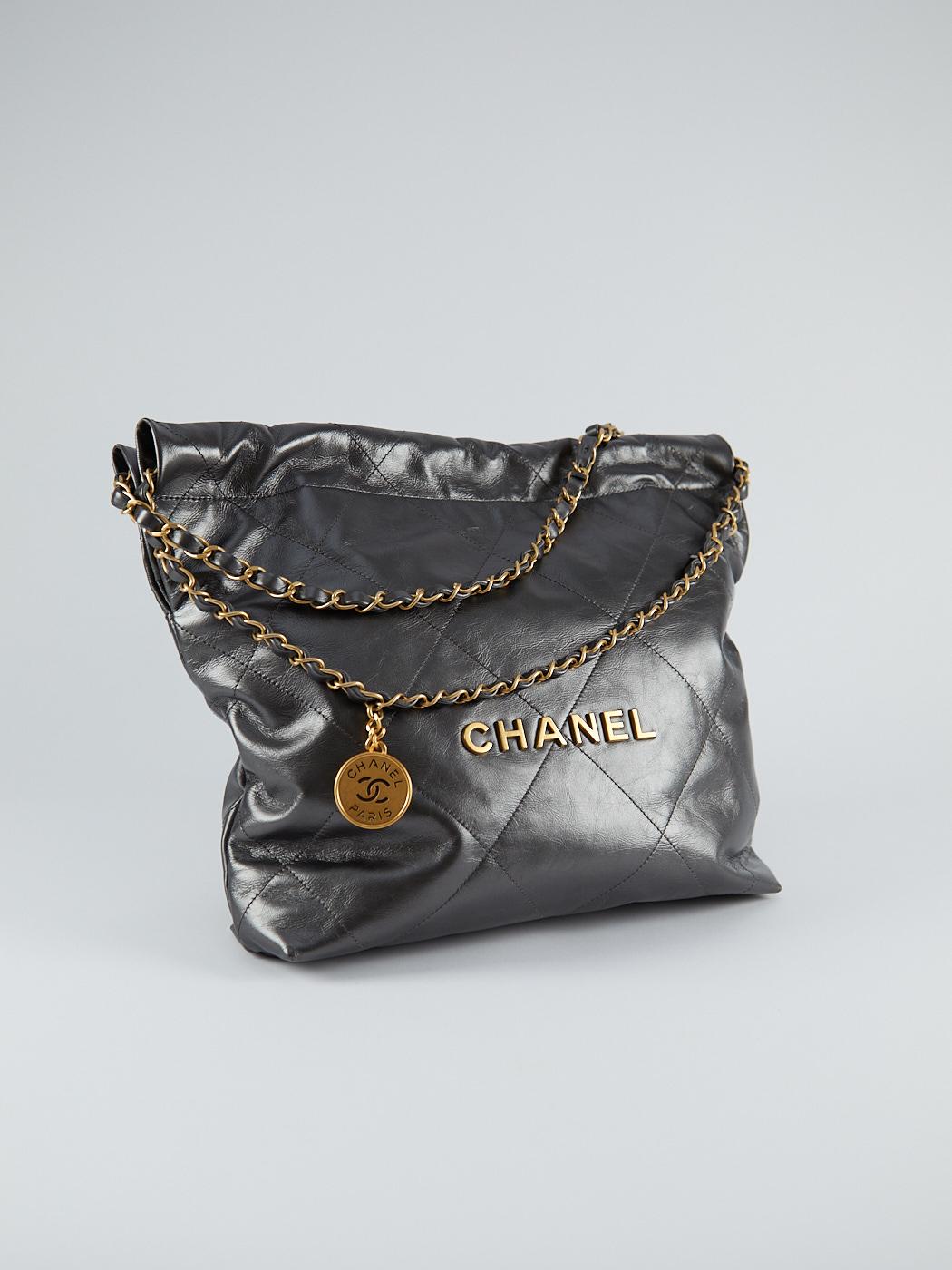 Chanel 22 Small Bag in Metallic 

Lambskin Leather with Gold-Tone & Ruthenium-Finish Hardware

Accompanied by: Chanel Box, Dustbag & Authenticity Chip

Dimensions: 34.5 x 37 x 8 cm