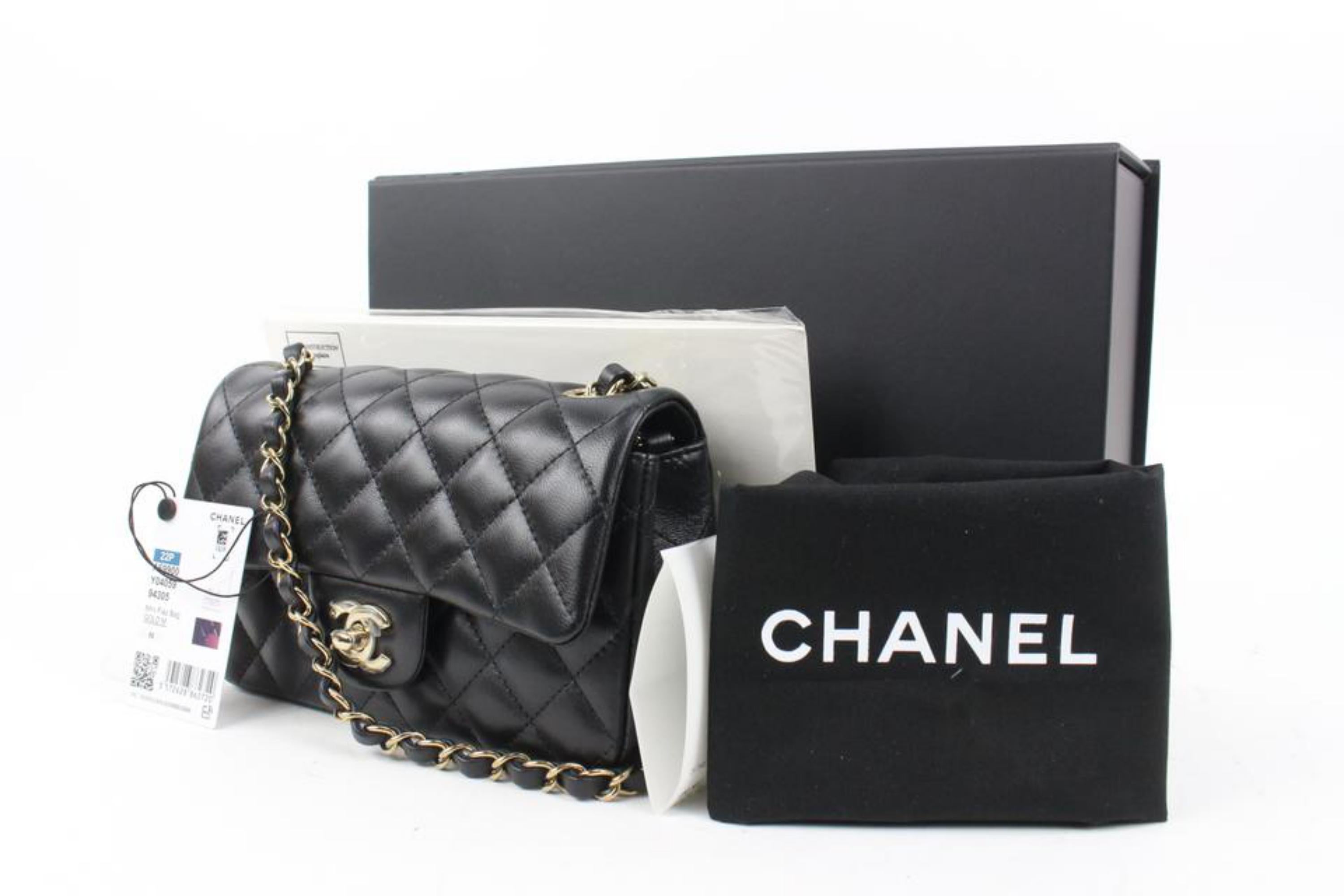 Chanel 22P Black Quilted Lambskin Mini Classic Flap Gold Chain Bag s215ca93
Date Code/Serial Number: T2CG1GU7
Made In: Italy
Measurements: Length:  7.75