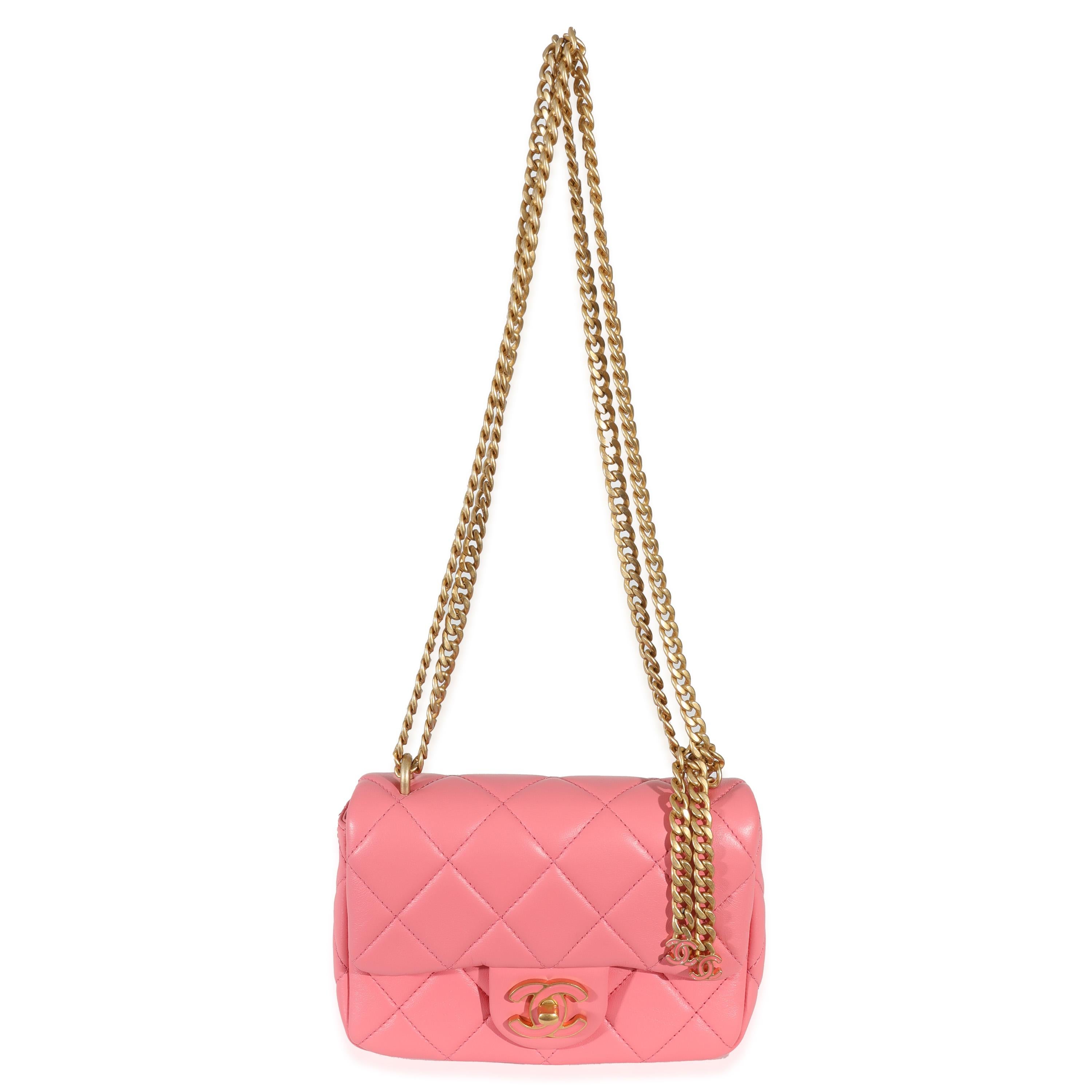 Listing Title: Chanel 22P Pink Lambskin Enamel Mini Pending Square Flap Bag
SKU: 130995
Condition: Pre-owned 
Condition Description: A timeless classic that never goes out of style, the flap bag from Chanel dates back to 1955 and has seen a number
