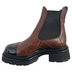 CHANEL 23A Quilted Leather Signature Logo Cap Toe Chelsea Flat Ankle Boots