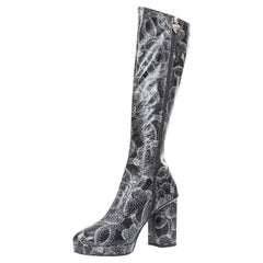 CHANEL 23A Runway white black CC camellia dotted logo print tall boots EU39
