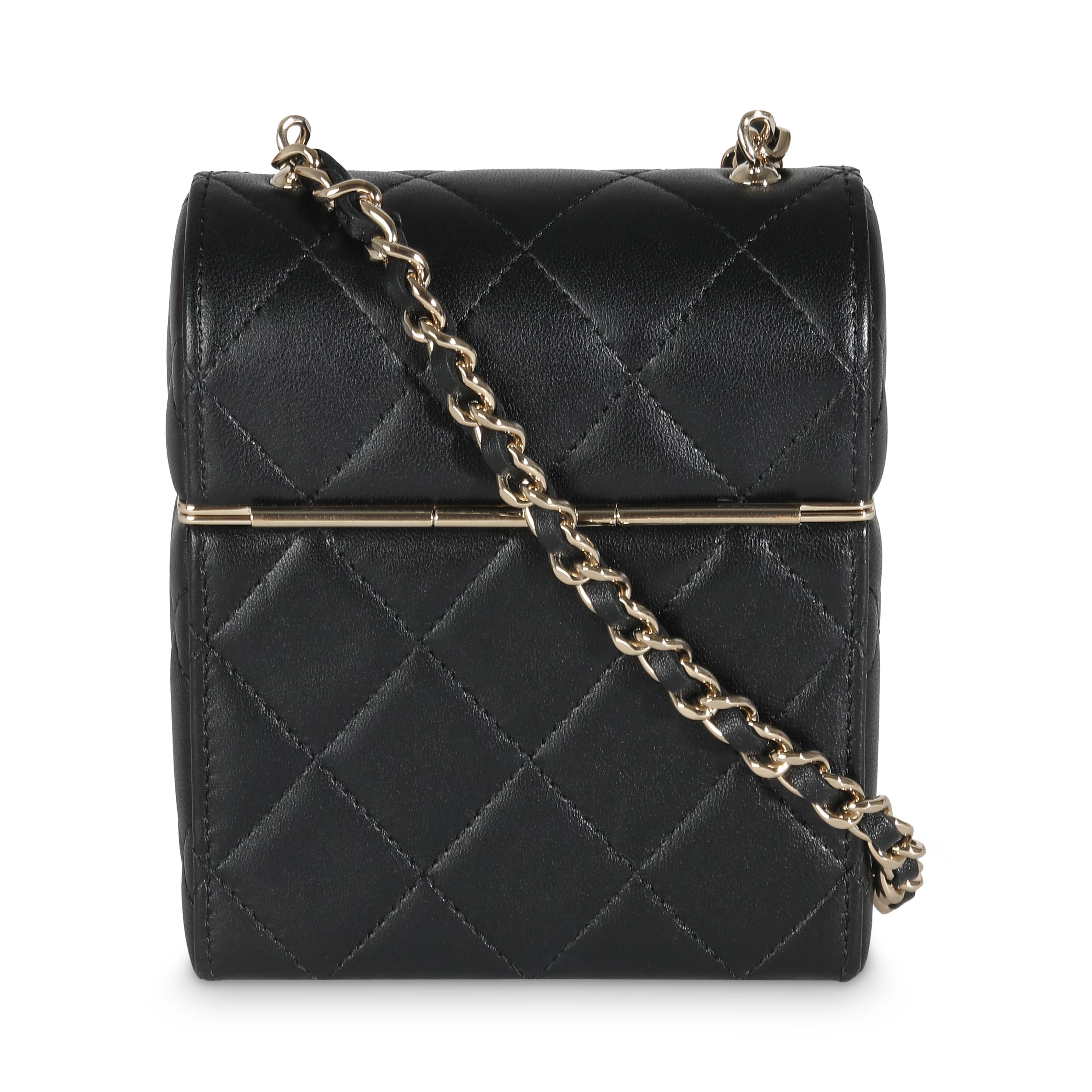 Listing Title: Chanel 23C Black Quilted Lambskin Box Chain Vanity
SKU: 141397
Condition: Pre-owned 
Handbag Condition: Very Good
Condition Comments: Item is in very good condition with minor signs of wear.  Indentations along bottom and exterior.