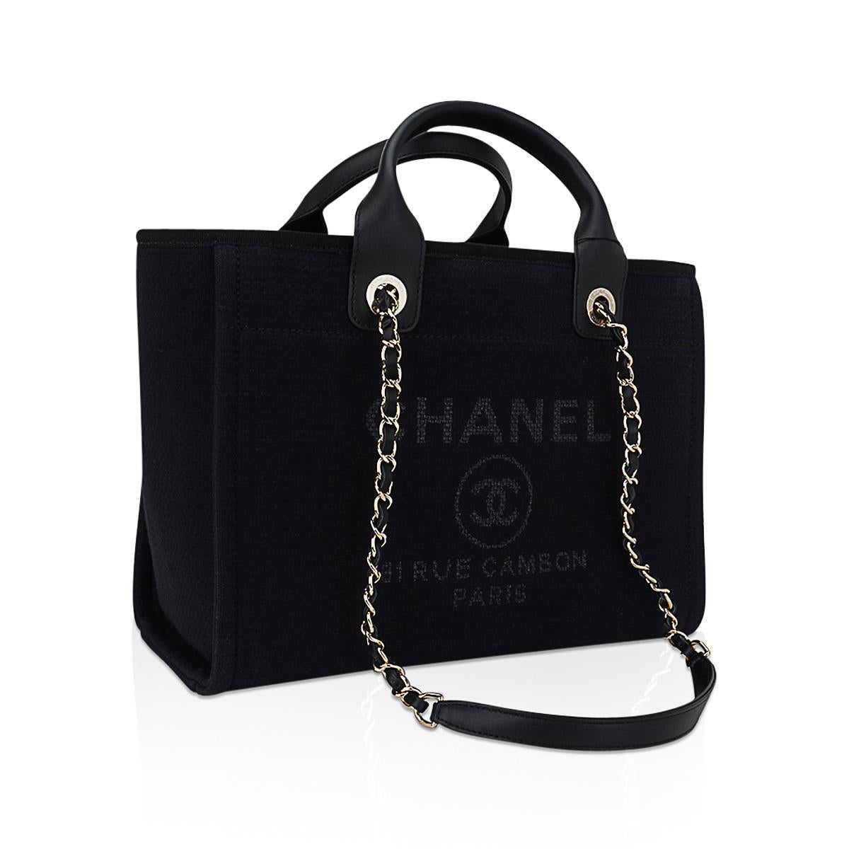 Mightychic offers a limited edition Chanel 23C 31 Rue Cambon small shopping tote featured in Black.
Gold Hardware with signature CC logo.
Exterior is Black mixed fiber fabric producing a rich textured look.
CHANEL Paris CC in an off Black for a