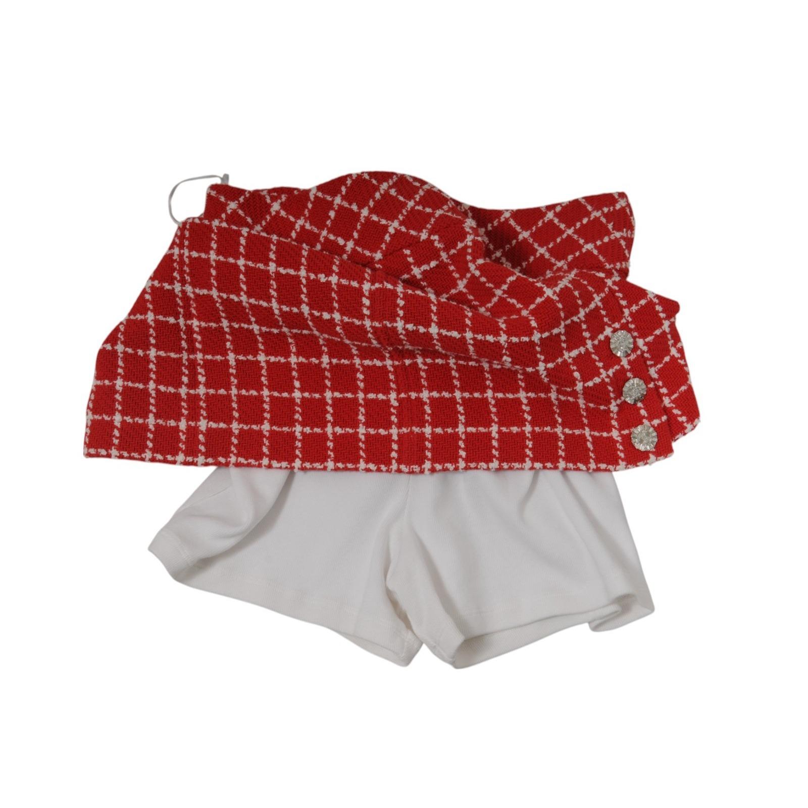 Chanel 23C Monico Tweed Minifalda Talla FR 40 Rojo Blanco CC Logo Acolchado Botón en venta 9