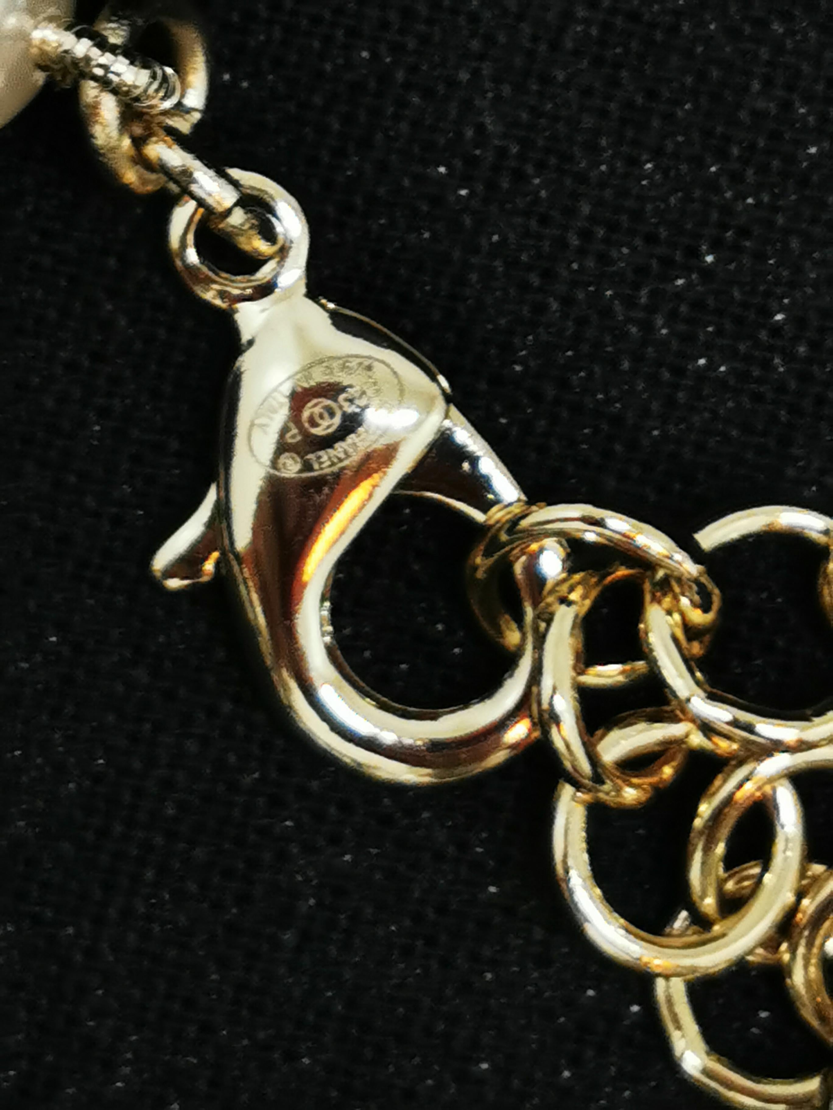 Contemporary Chanel 23P Pearl Choker with Star & Iconic CC Logo Pendant For Sale
