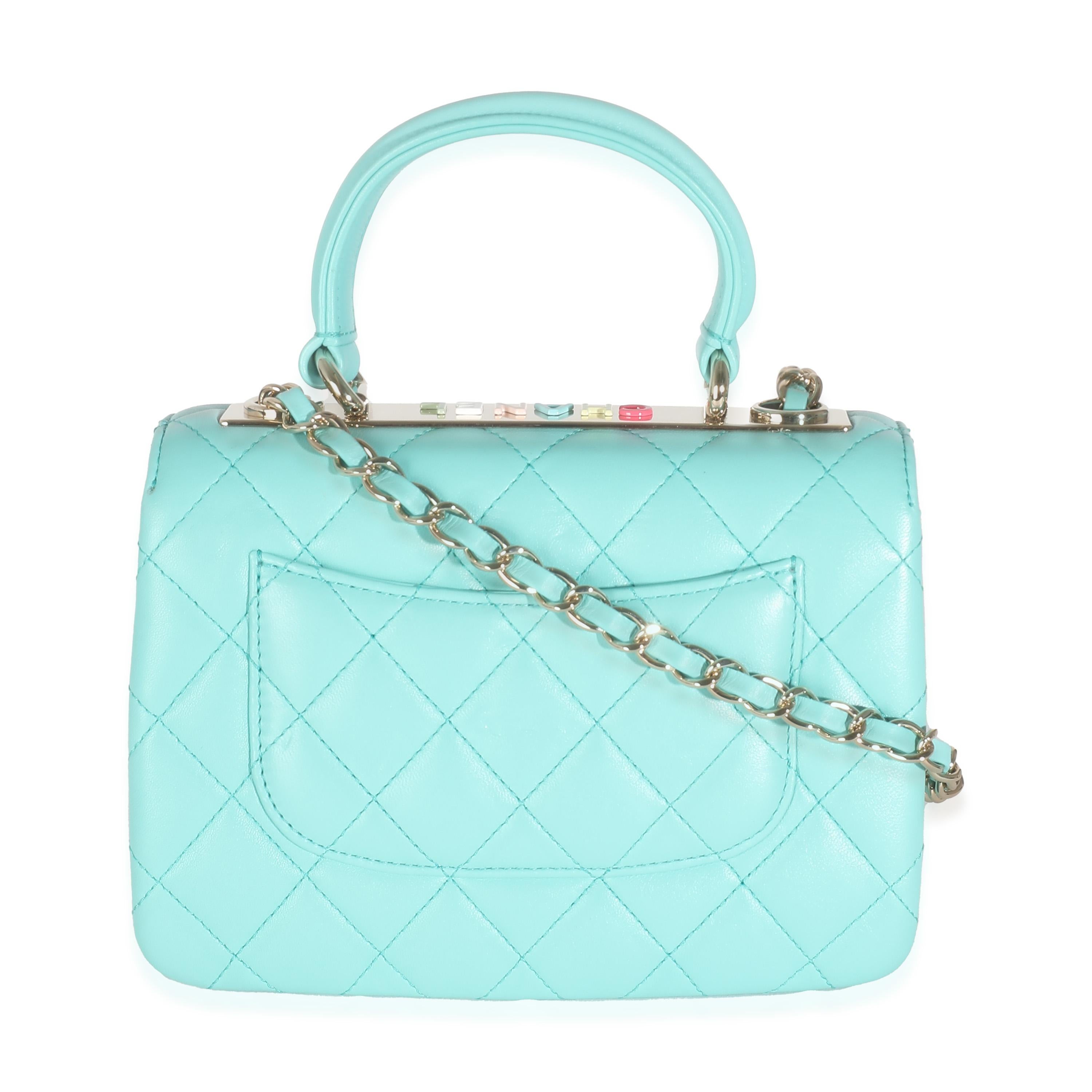 Listing Title: Chanel 24C Turquoise Quilted Lambskin Mini Trendy Top Handle
SKU: 143345
MSRP: 6800.00 USD
Condition: Pre-owned 
Condition Description: Intrinsically Chanel, the medium Coco top handle bag was named after the maison's founder.