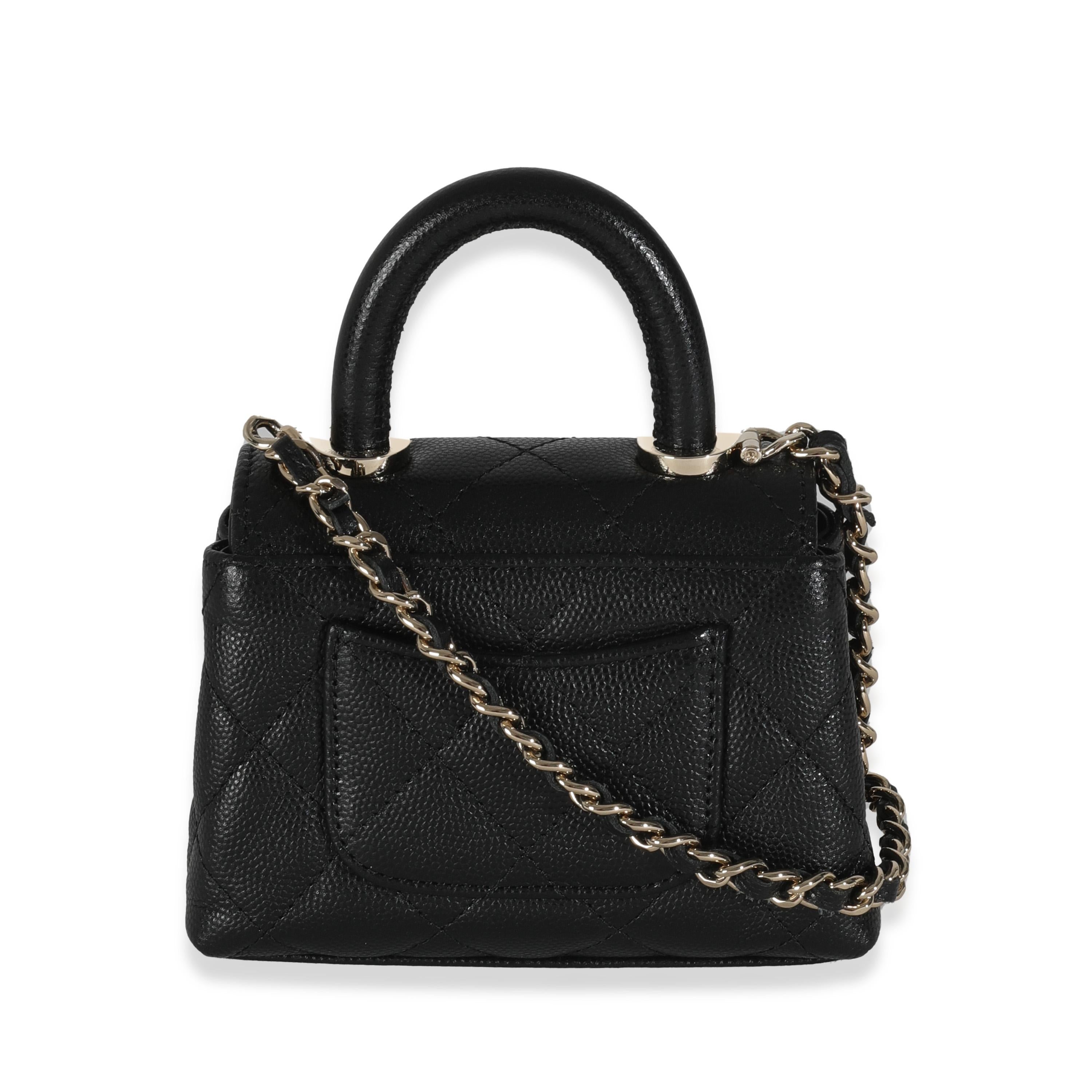 Listing Title: Chanel 24K Black Quilted Caviar Coco Top Handle Clutch With Chain
SKU: Z144499
Condition: Pre-owned 
Condition Description: Intrinsically Chanel, the medium Coco top handle bag was named after the maison's founder. Introduced in 2015,