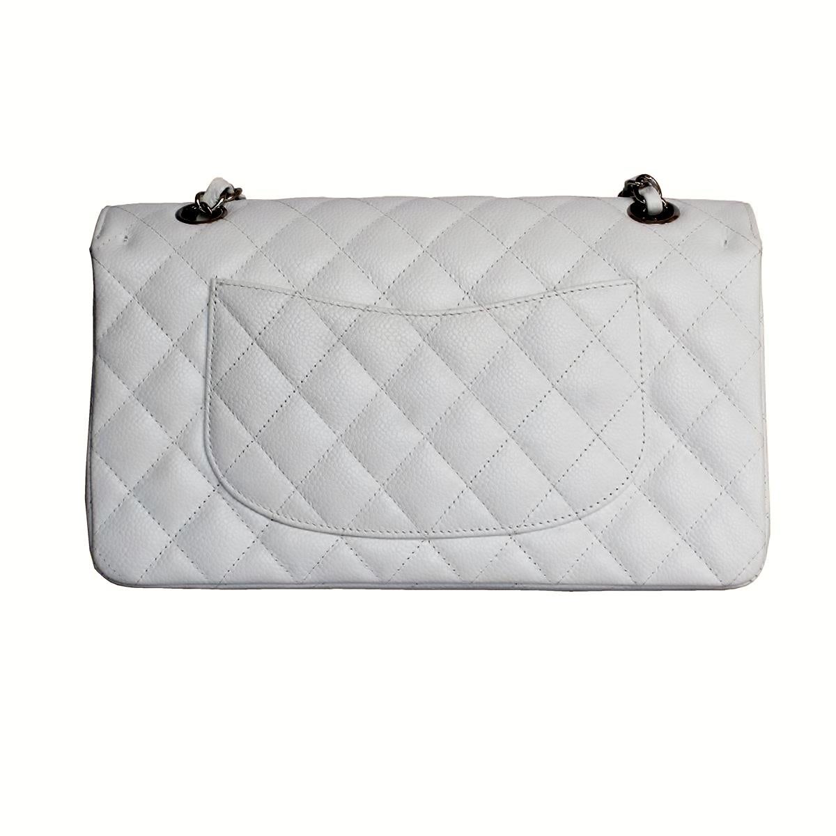 Fantastic and iconic Chanel bag in a mervellous white color
Grained calfskin
White color
Metal chain
External pocket
Flap
Internal zip pocket and additional 3 pockets
Used once, coming with card and dustbag
Serial number 11154374
Years 2006 /