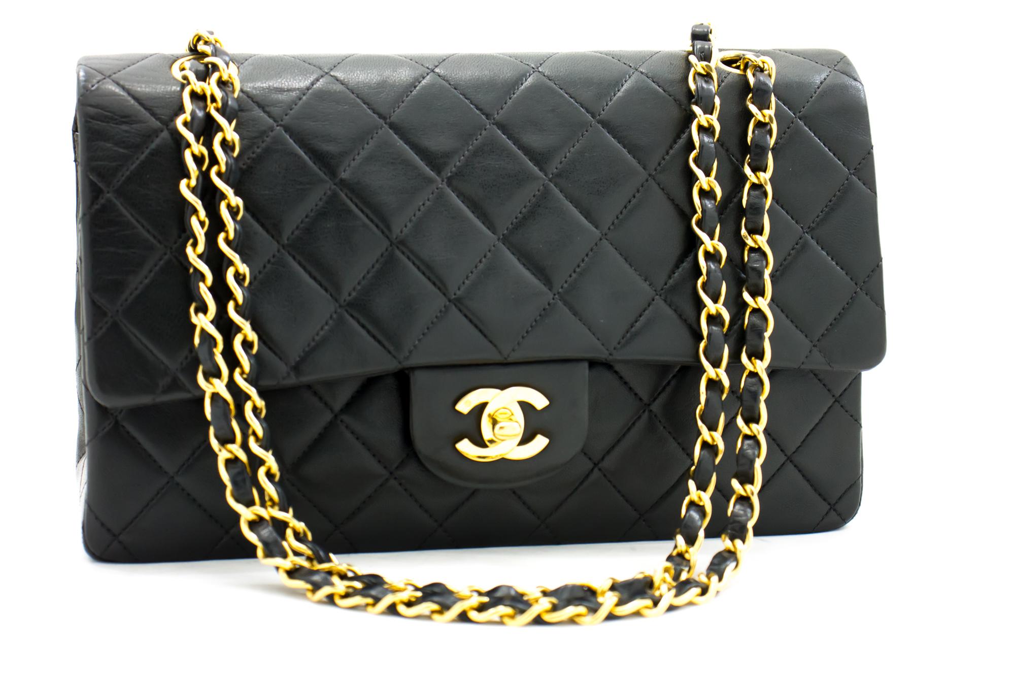 An authentic CHANEL 2.55 Classic Double Flap Medium Chain Shoulder Bag Black made of black Lambskin. The color is Black. The outside material is Leather. The pattern is Solid. This item is Contemporary. The year of manufacture would be