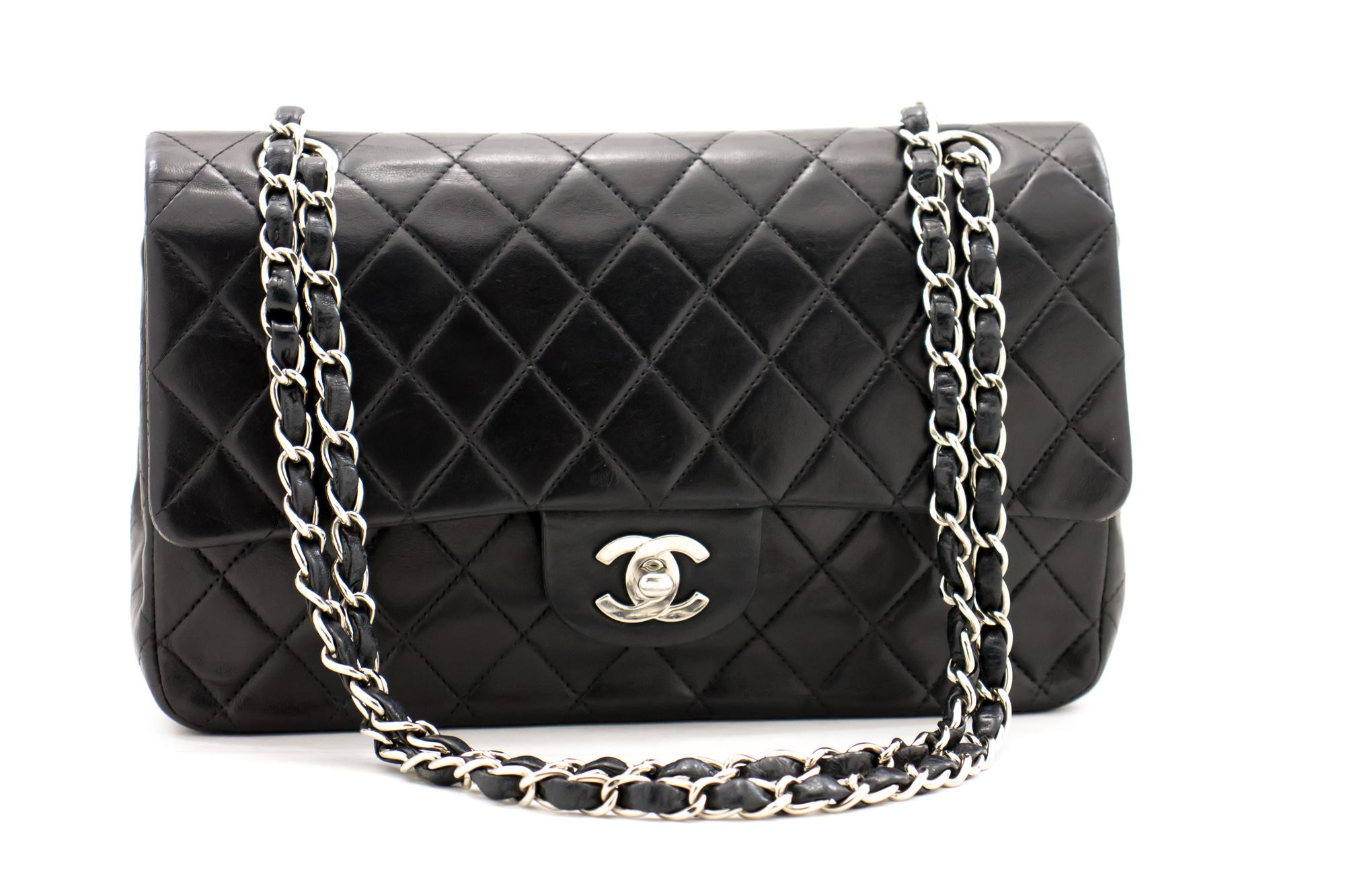 An authentic CHANEL 2.55 Classic Double Flap Medium Silver Chain Shoulder Bag Black. The color is Black. The outside material is Leather. The pattern is Solid. This item is Contemporary. The year of manufacture would be 2000-2 0 0 2 .
Conditions &